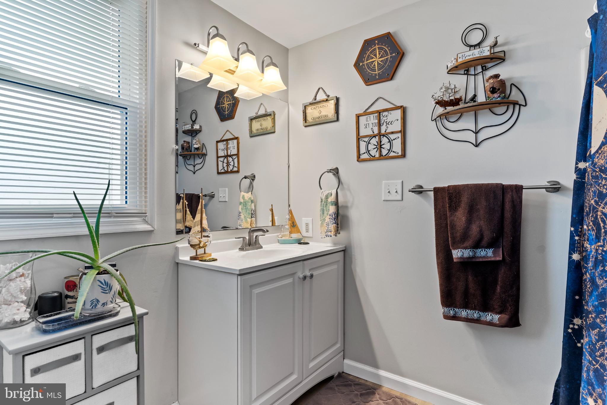 1060 Dry Tavern Road Denver, PA 17517 - Photo 17 of 30 a bathroom with a sink and a mirror