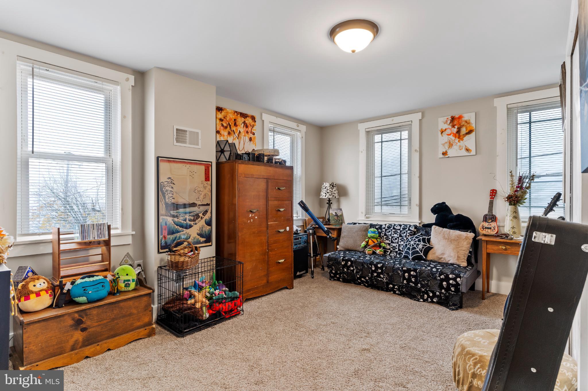 1060 Dry Tavern Road Denver, PA 17517 - Photo 18 of 30 a bed room with furniture and a window