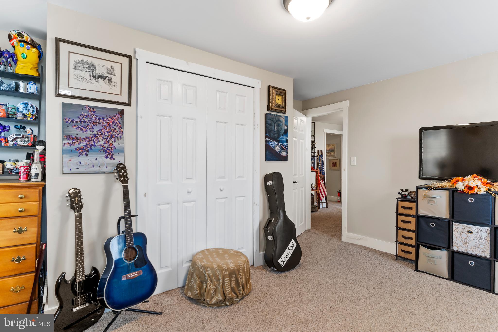 1060 Dry Tavern Road Denver, PA 17517 - Photo 19 of 30 a bedroom with furniture and closet