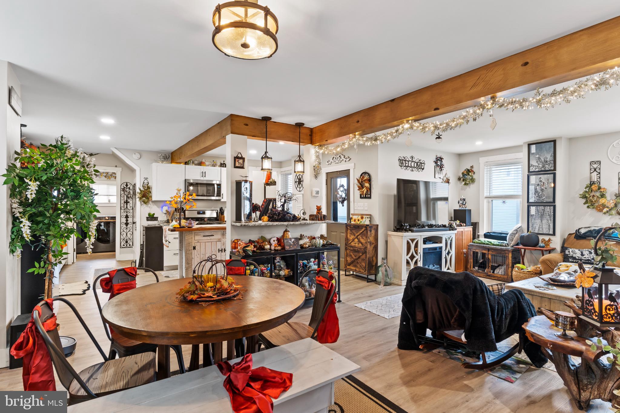 1060 Dry Tavern Road Denver, PA 17517 - Photo 7 of 30 a living room with lots of furniture and a chandelier