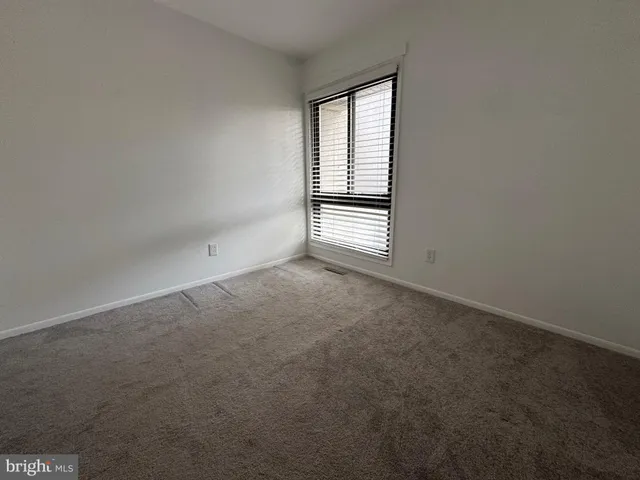 a view of empty room with front door