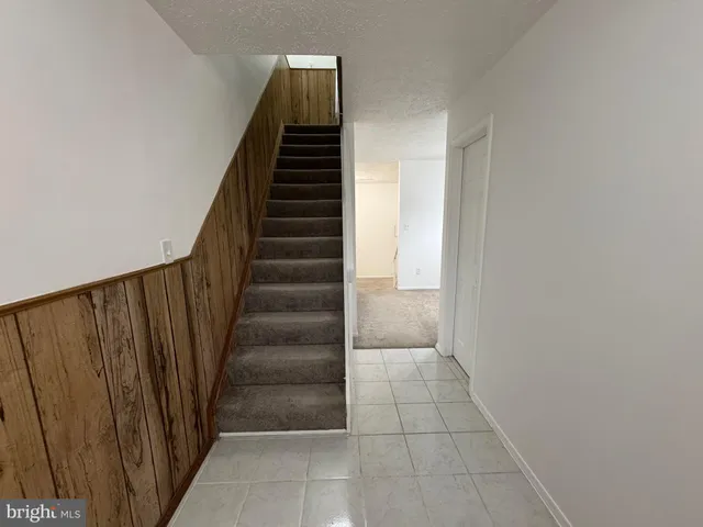 a view of an entryway with staircase