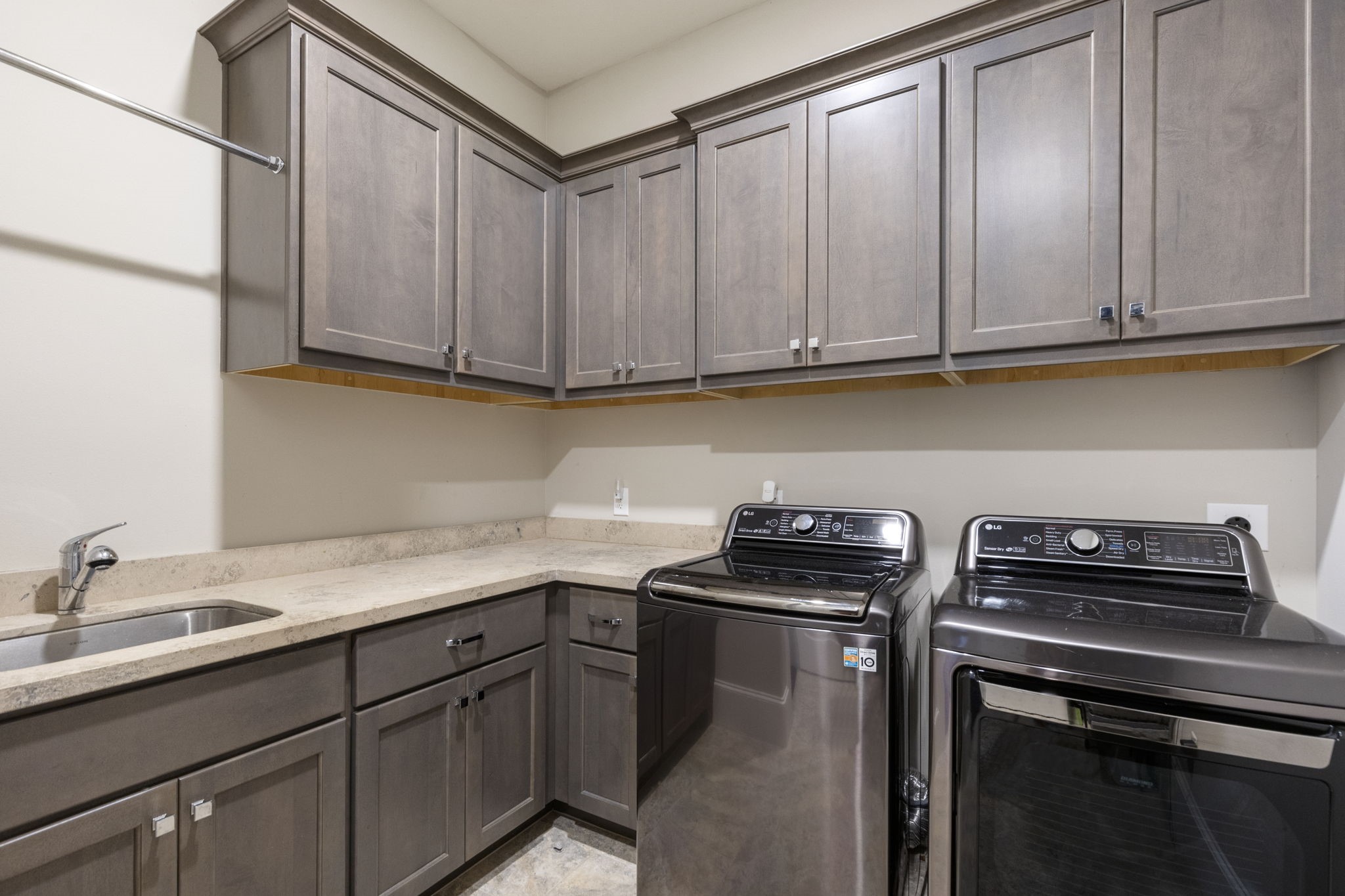 6806 West Warwick Lake Lane Spring, TX 77389 - Photo 42 of 50 a kitchen with a sink and cabinets
