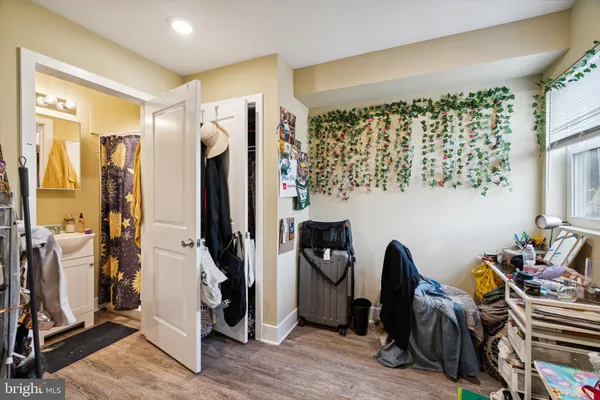 a view of a workspace with furniture and gym equipment