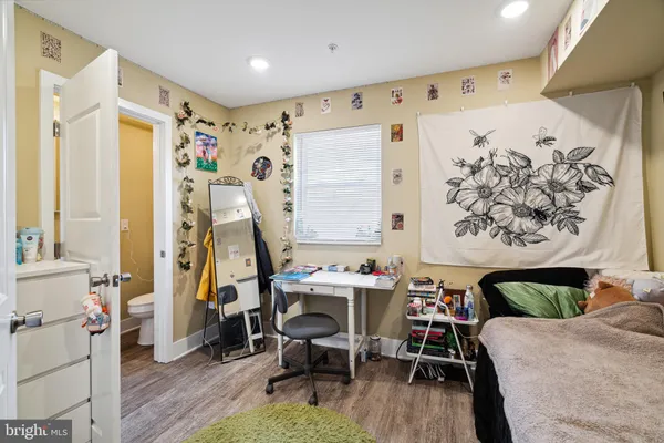 a room with furniture and a wooden floor