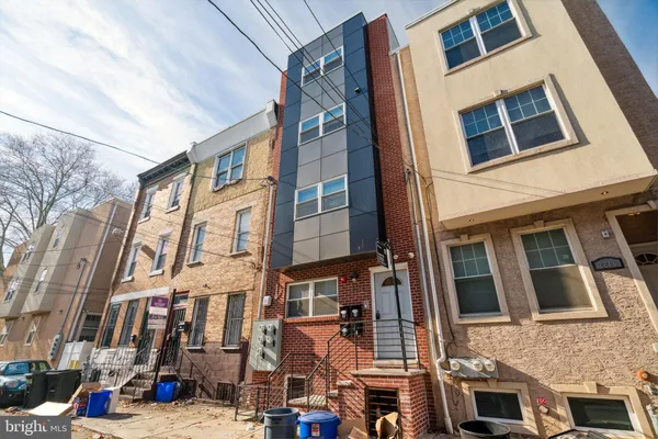 a view of a building with a street