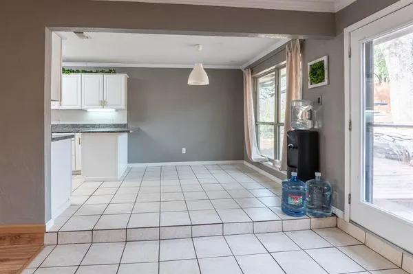 a room with window and furniture