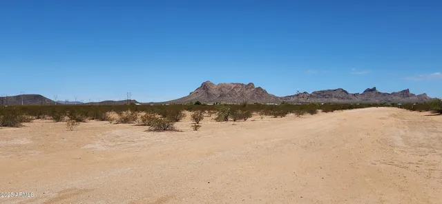 a view of a road with an ocean view