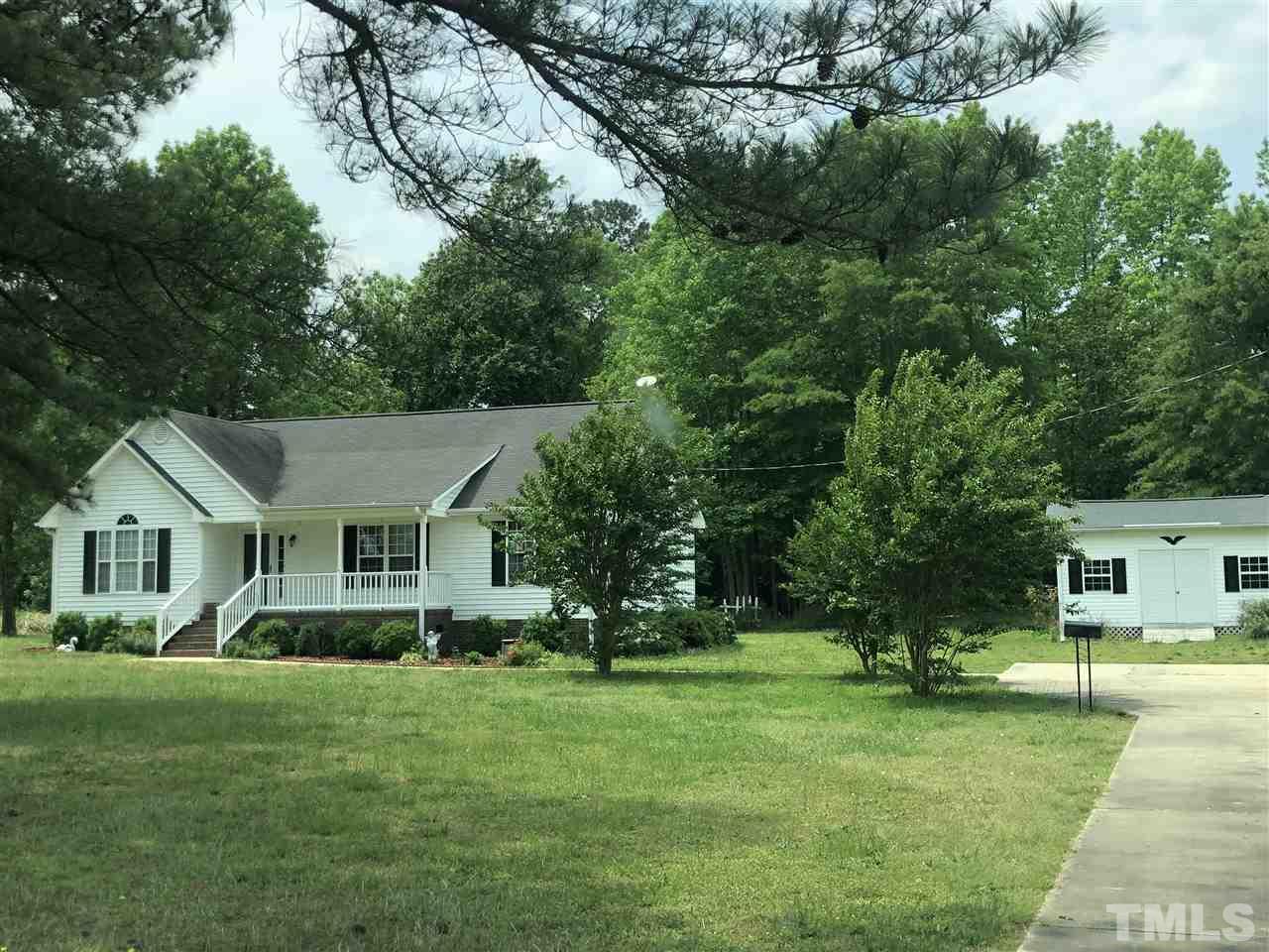 8211 Byrd Road Sims, NC 27880 - Photo 2 of 8 a front view of a house with a yard