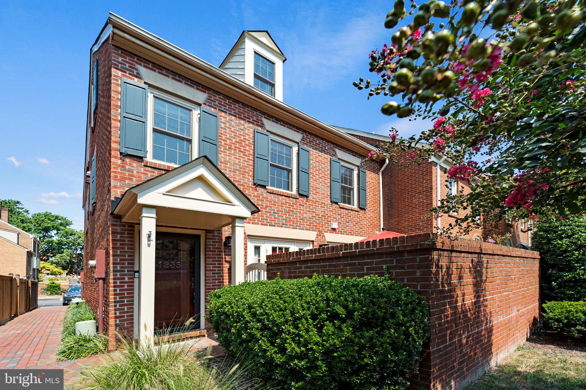 1235 Portner Road Alexandria, VA 22314 - Photo 1 of 23 a front view of a house with a tree