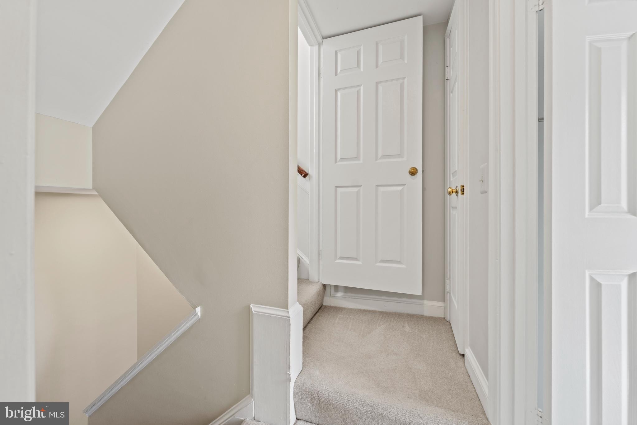 1235 Portner Road Alexandria, VA 22314 - Photo 15 of 23 a view of a hallway with white walls