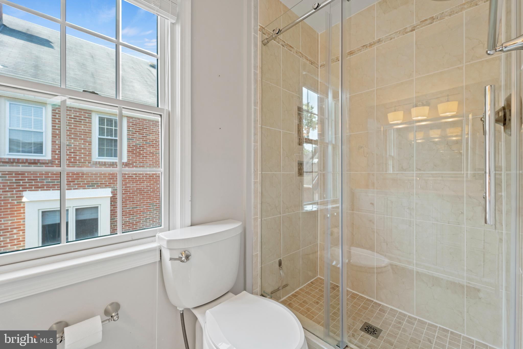 1235 Portner Road Alexandria, VA 22314 - Photo 21 of 23 a bathroom with a toilet and shower