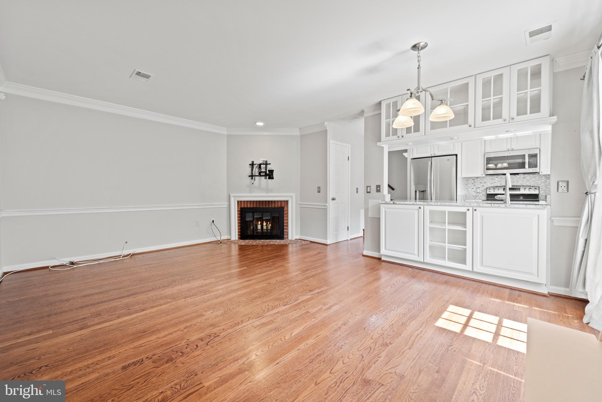 1235 Portner Road Alexandria, VA 22314 - Photo 3 of 23 a view of a livingroom with wooden floor