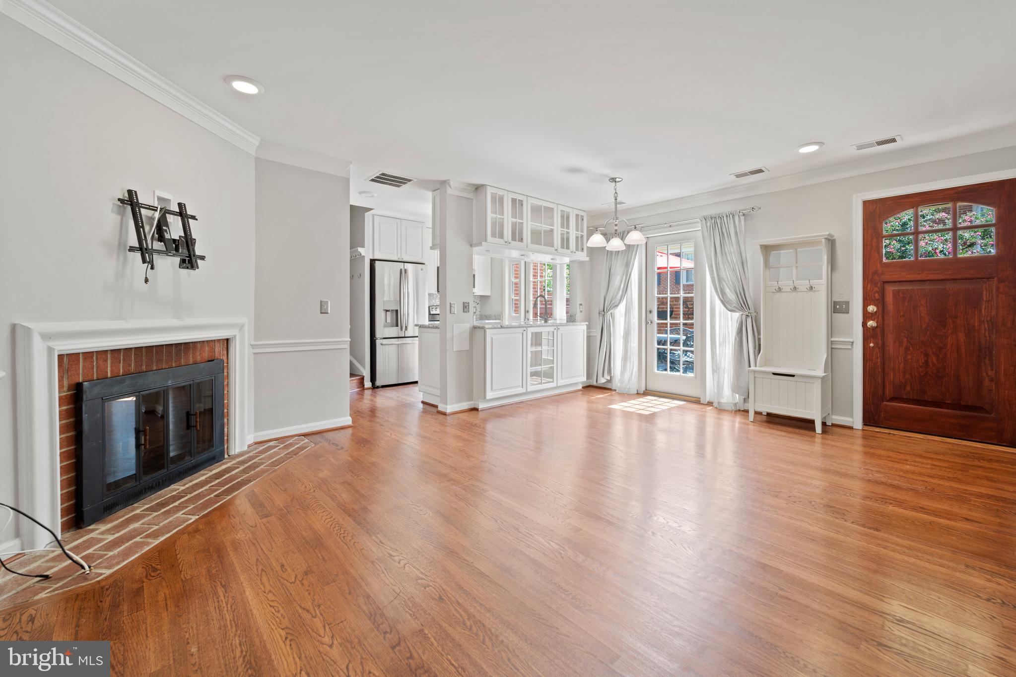 1235 Portner Road Alexandria, VA 22314 - Photo 4 of 23 a view of an empty room with a fireplace