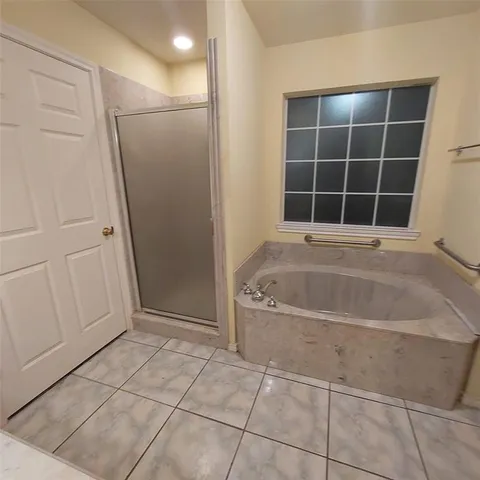 a view of empty room with windows