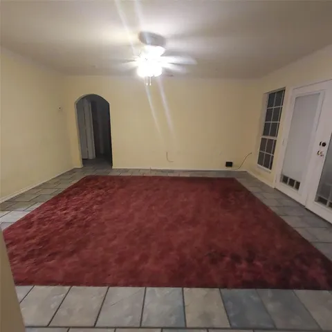 a view of a livingroom with a staircase