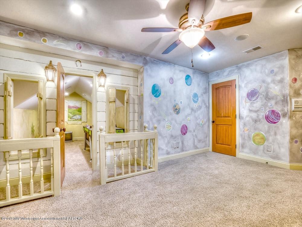 1407 Ranch Drive Senatobia, MS 38668 - Photo 48 of 65 3rd Floor Bedroom and Play Room