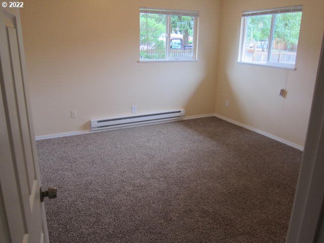 17354 Southwest Merlo Road Beaverton, OR 97003 - Photo 21 of 32 an empty room with windows