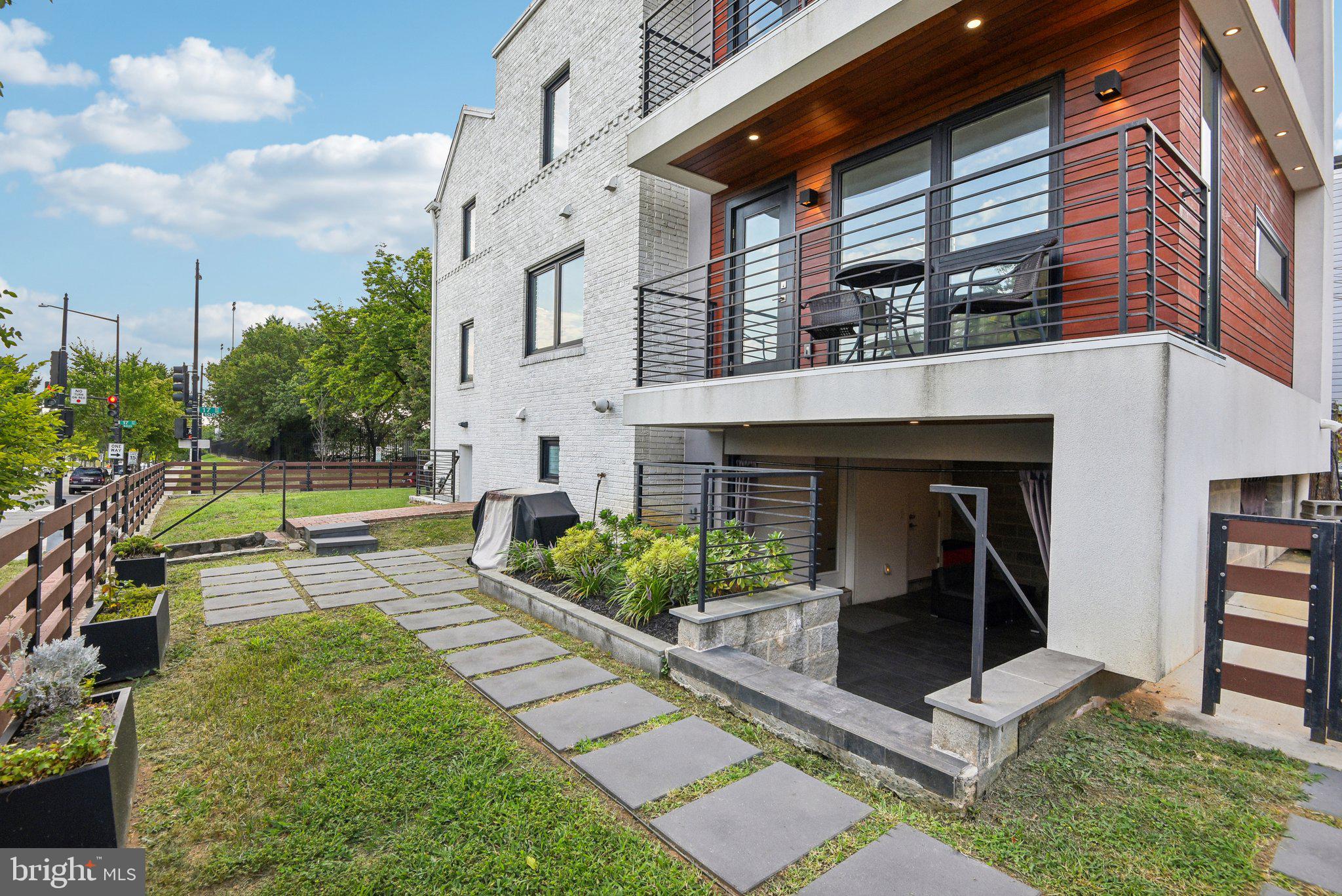 128 17th Street Northeast Washington, DC 20002 - Photo 2 of 42 a view of a house with backyard and sitting area