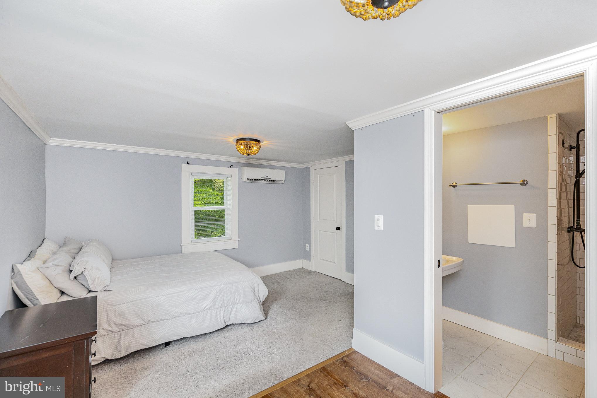 1030 White Oak Road Fredericksburg, VA 22405 - Photo 14 of 25 a bedroom with a bed and a window