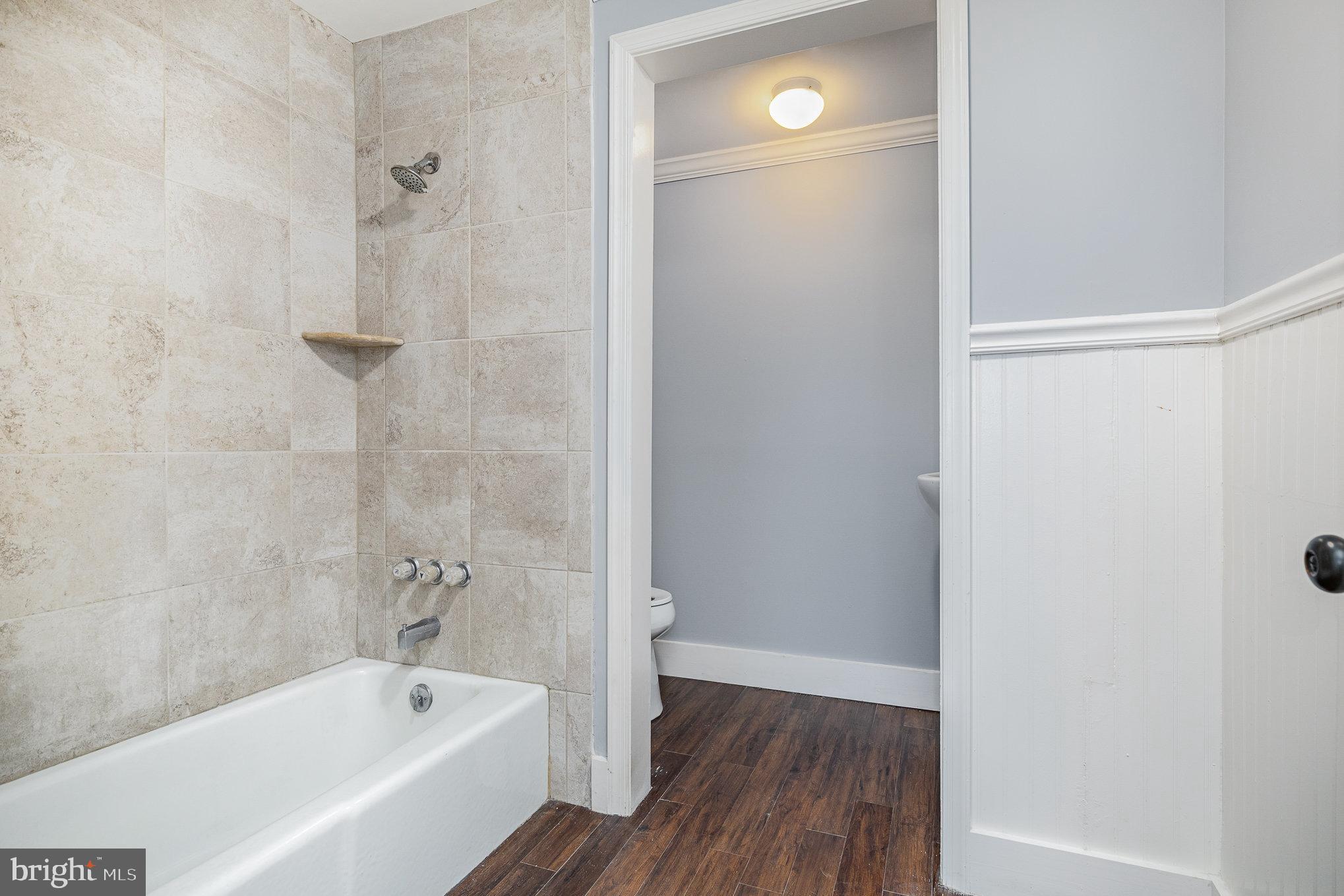 1030 White Oak Road Fredericksburg, VA 22405 - Photo 15 of 25 a bathroom with a bathtub and a shower