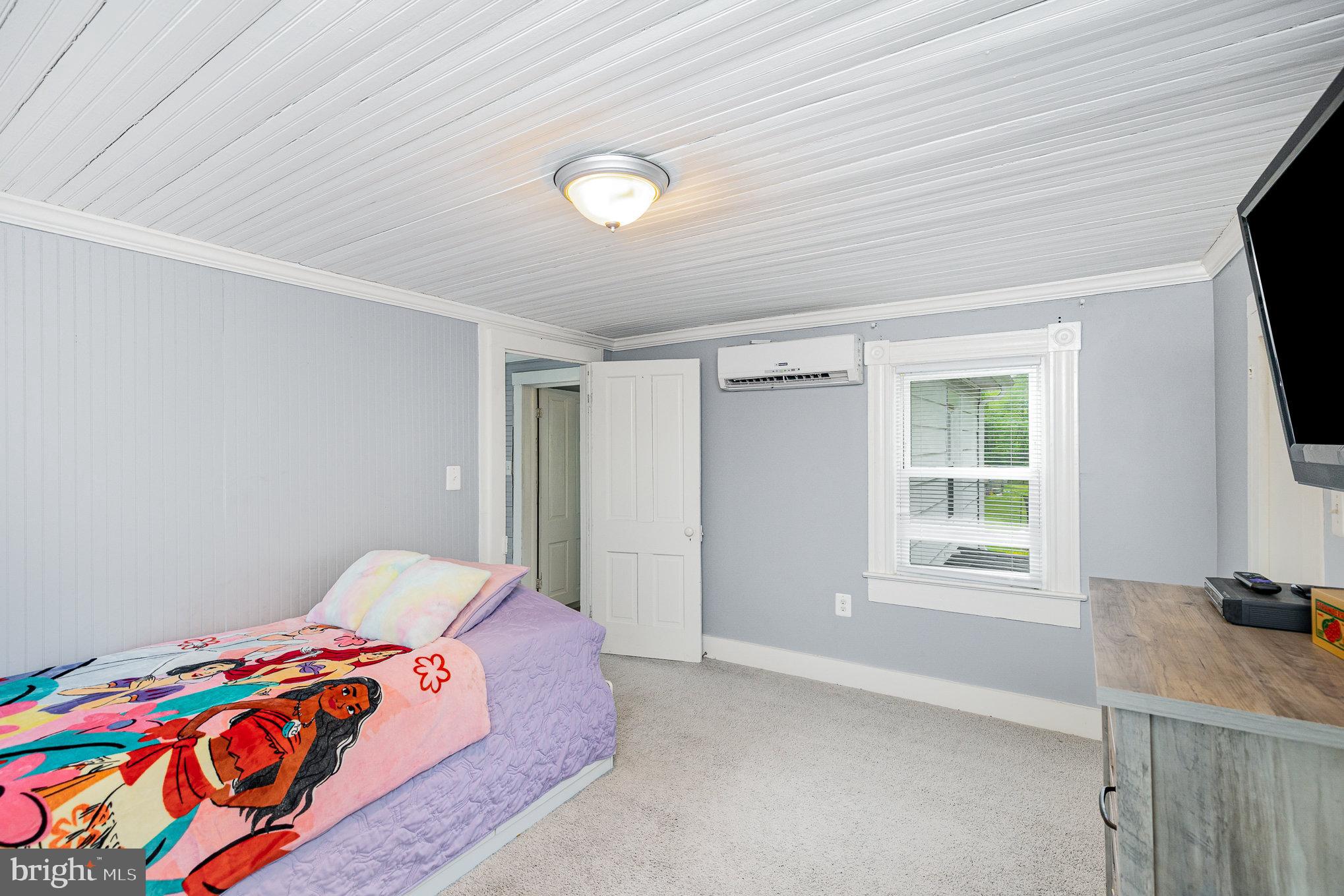 1030 White Oak Road Fredericksburg, VA 22405 - Photo 19 of 25 a bedroom with a bed and a window