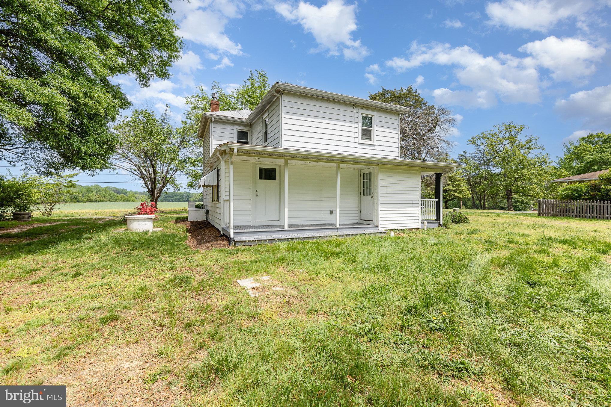 1030 White Oak Road Fredericksburg, VA 22405 - Photo 20 of 25 a view of a backyard with large trees