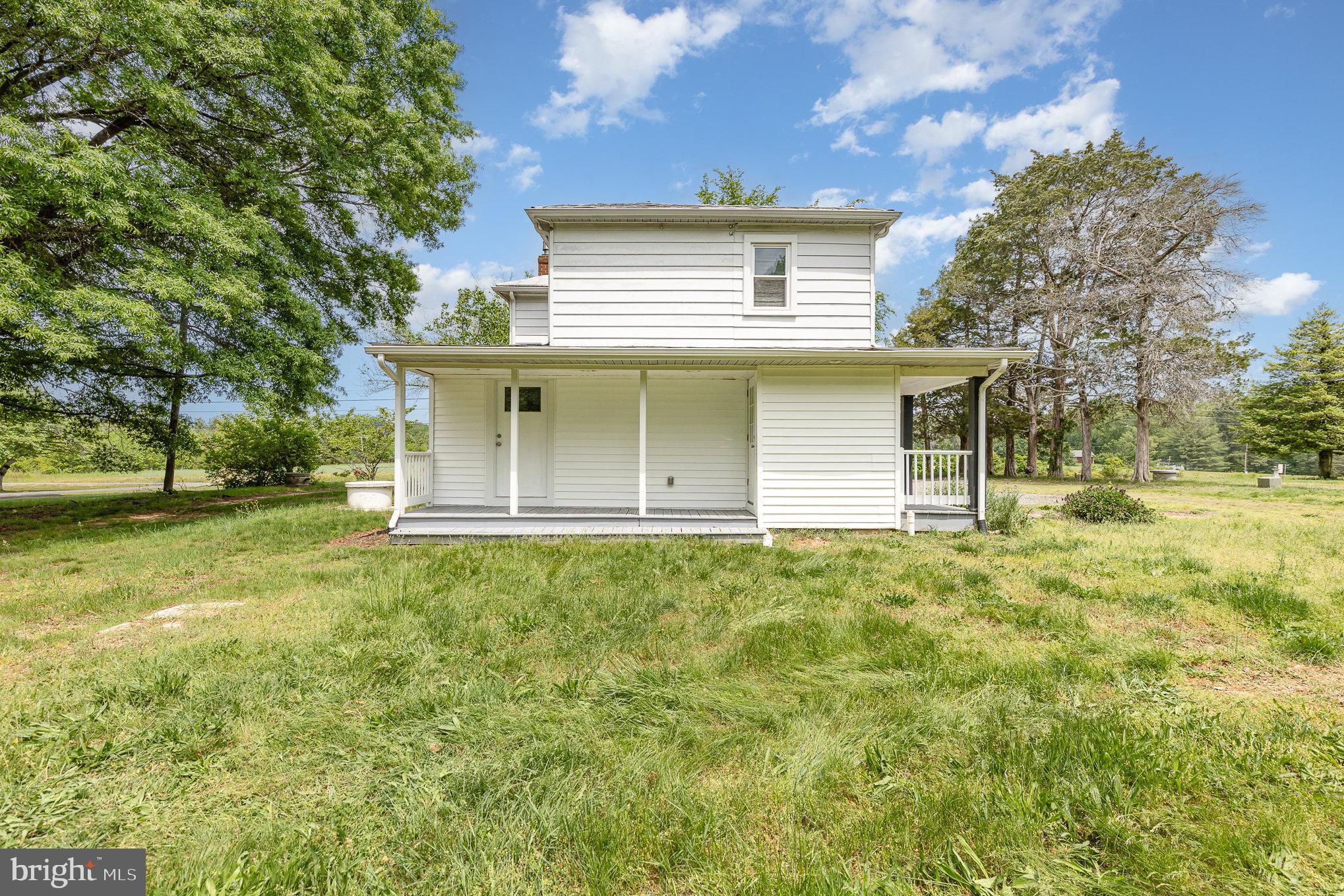 1030 White Oak Road Fredericksburg, VA 22405 - Photo 21 of 25 front view of a house with a yard