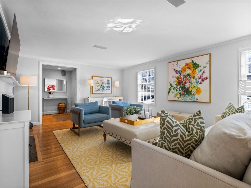 7 Madison Road Wellesley, MA 02481 - Photo 14 of 27 a living room with furniture and a flat screen tv