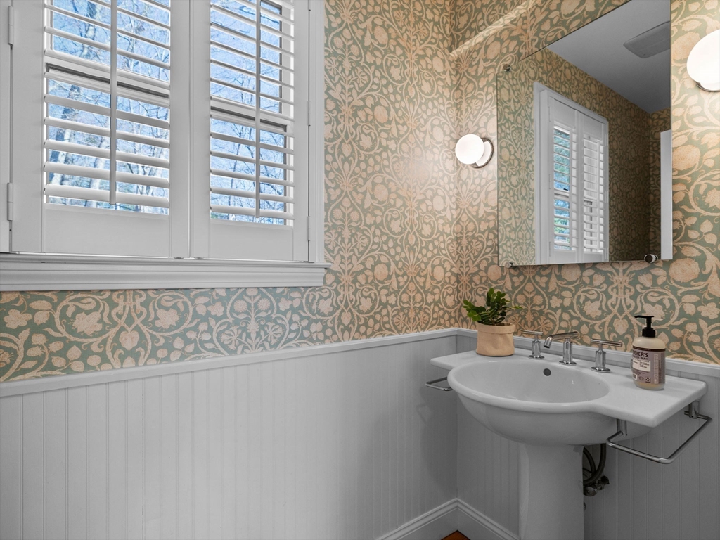 7 Madison Road Wellesley, MA 02481 - Photo 15 of 27 a bathroom with a sink and a mirror