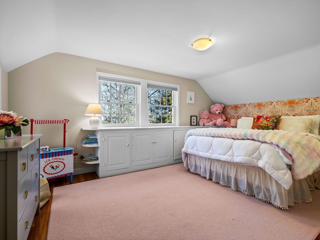 7 Madison Road Wellesley, MA 02481 - Photo 20 of 27 a bedroom with a bed and a window