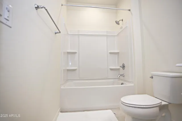 a bathroom with a sink vanity and a mirror
