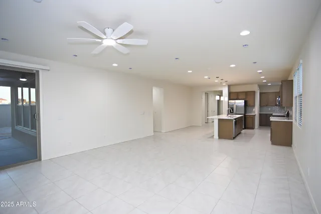 a view of kitchen with furniture and window