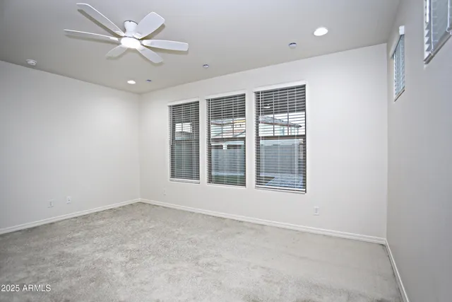 a bathroom with a sink a mirror and a shower