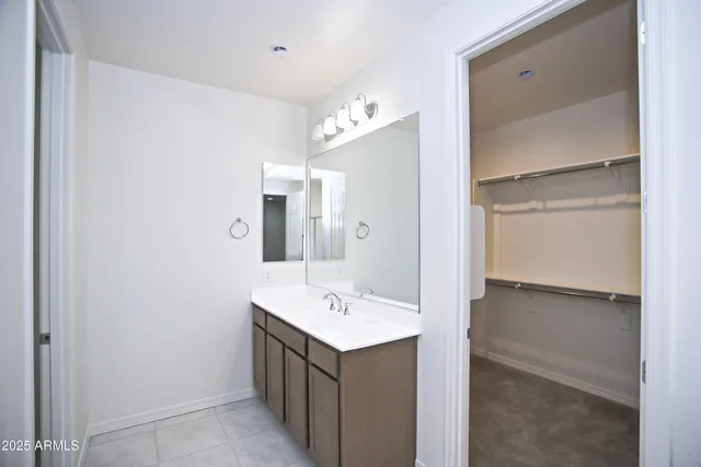 a view of an empty walk in closet