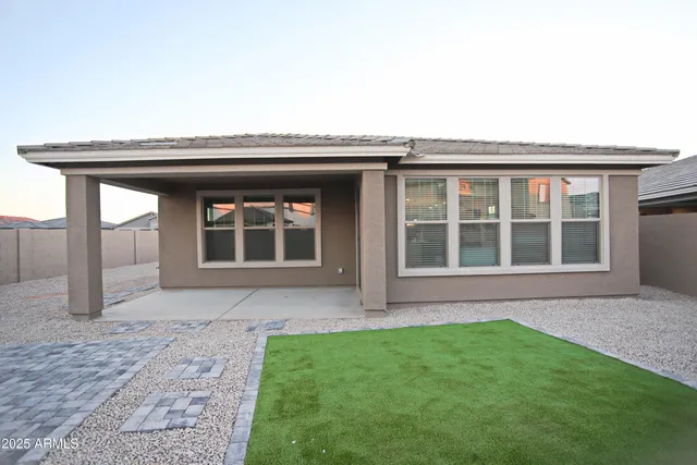 a house view with a garden space