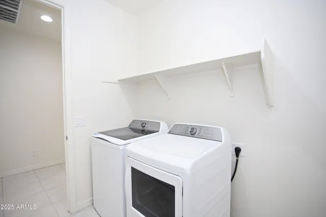 a view of a golf course with a lake