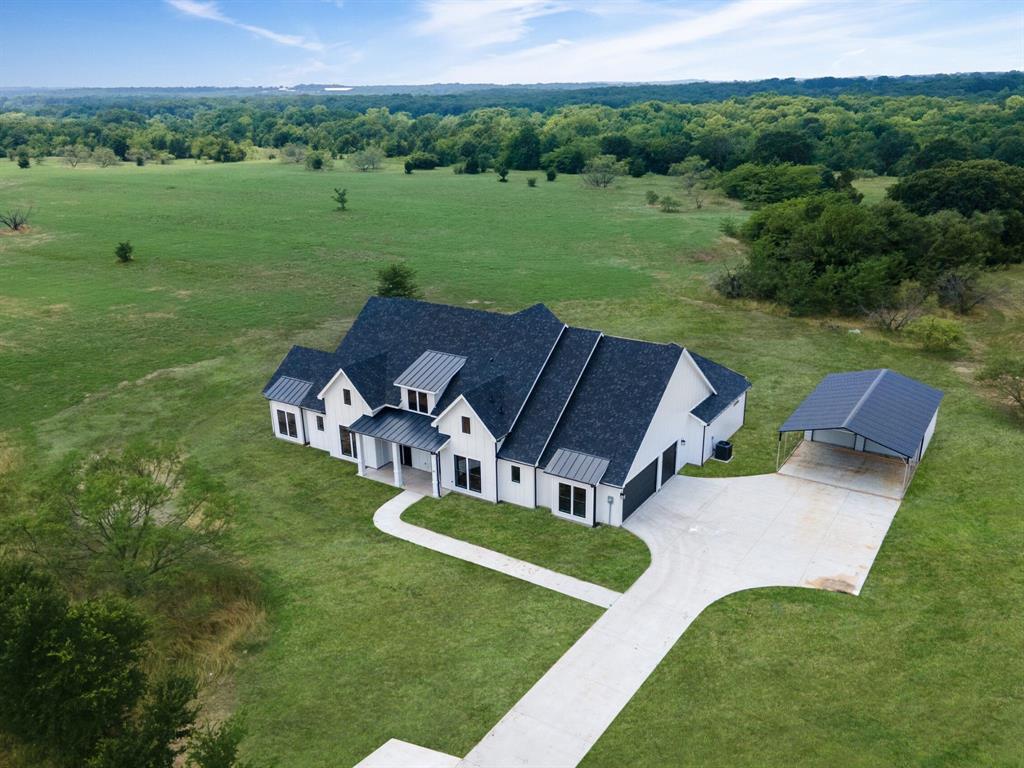 7 William Brewer Road Collinsville, TX 76233 - Photo 5 of 16 an aerial view of a house with big yard