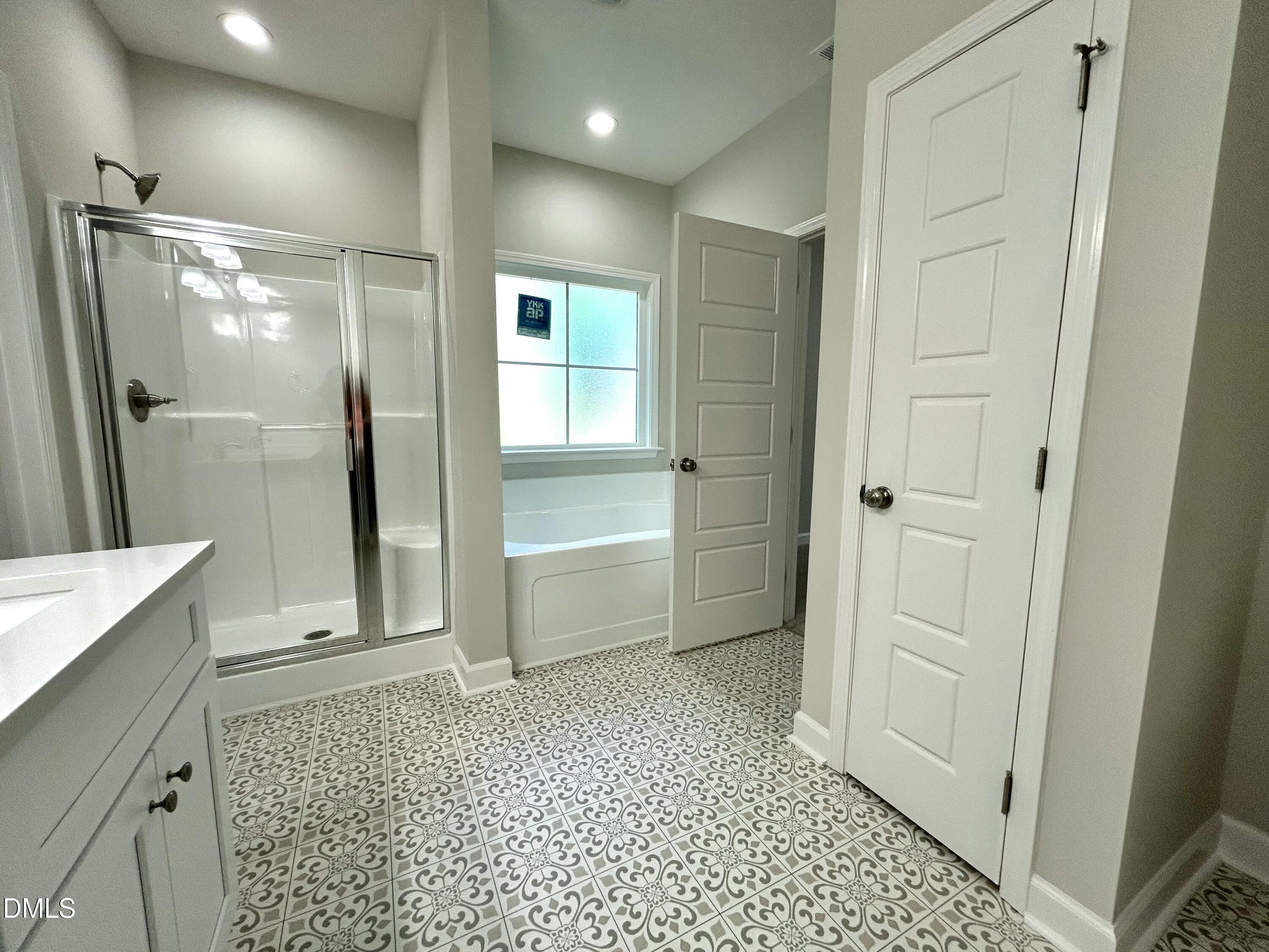 1702 Cardinal Drive Deep Run, NC 28525 - Photo 20 of 21 a bathroom with a shower and a tub