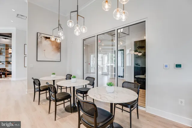 a view of a dining area with furniture window and outside view