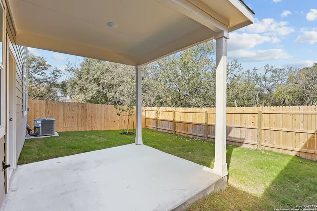 a view of a backyard with garden