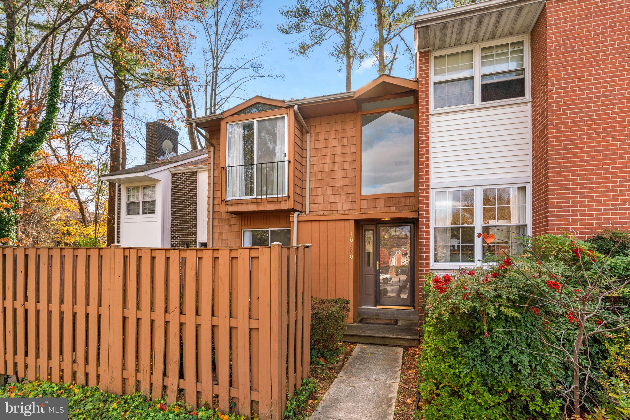 10390 May Wind Court Columbia, MD 21044 - Photo 2 of 29 a view of a house with wooden fence