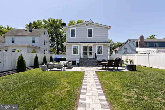a front view of house with yard