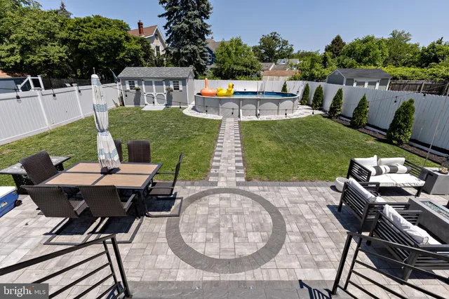 a view of a chairs and table in the patio