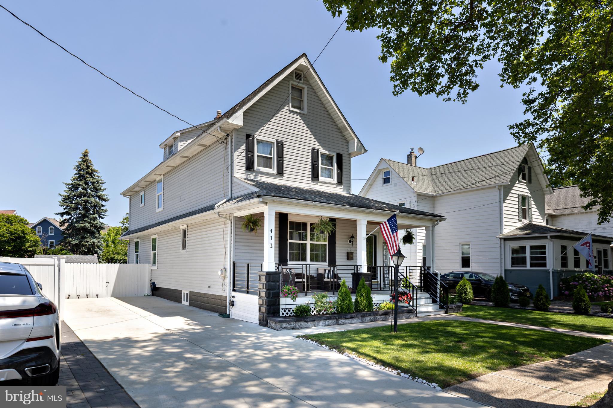 412 Horace Avenue Palmyra, NJ 08065 - Photo 24 of 24 a front view of a house with a yard