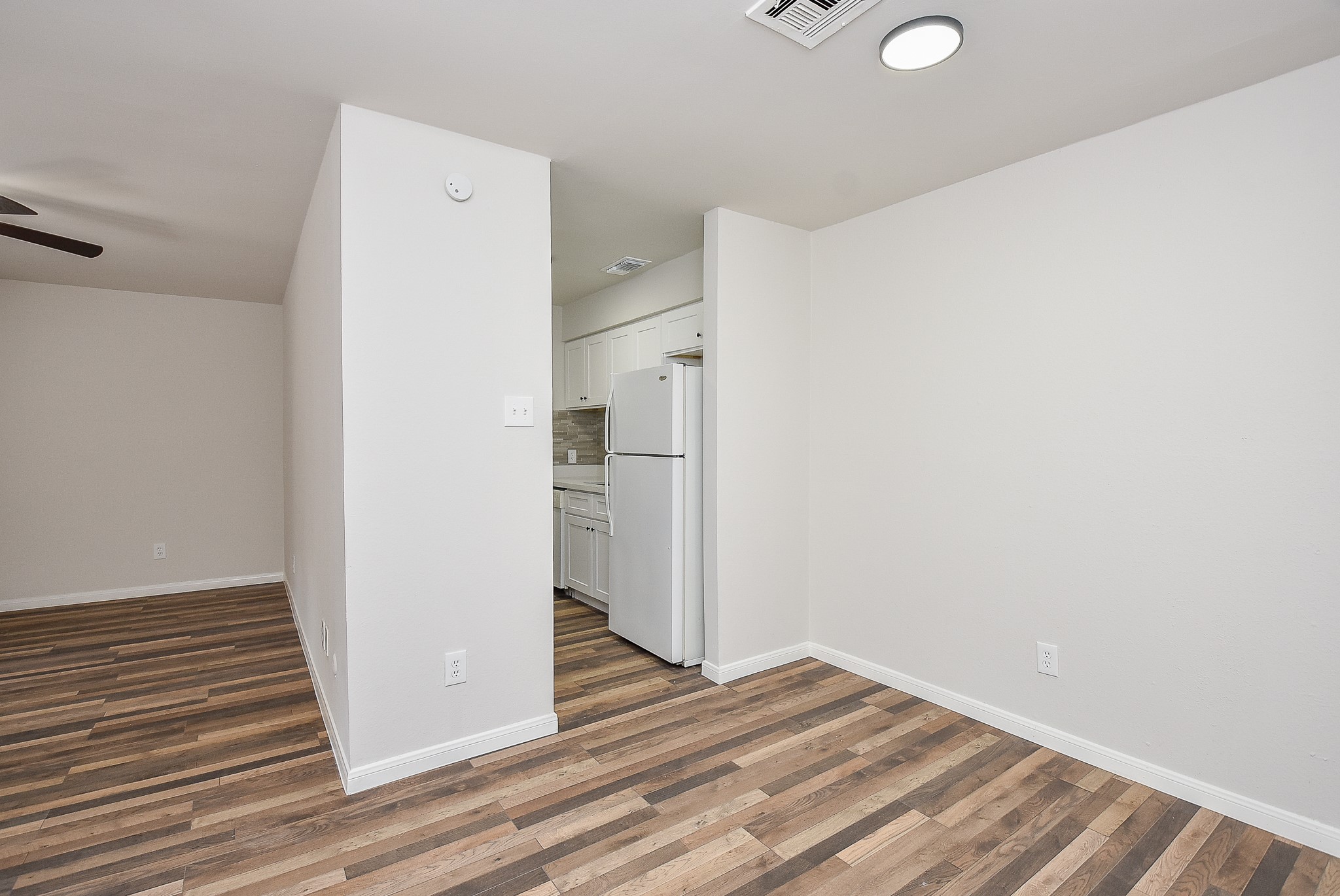 3644 Ocee Street Houston, TX 77063 - Photo 12 of 32 a view of a kitchen with wooden floor