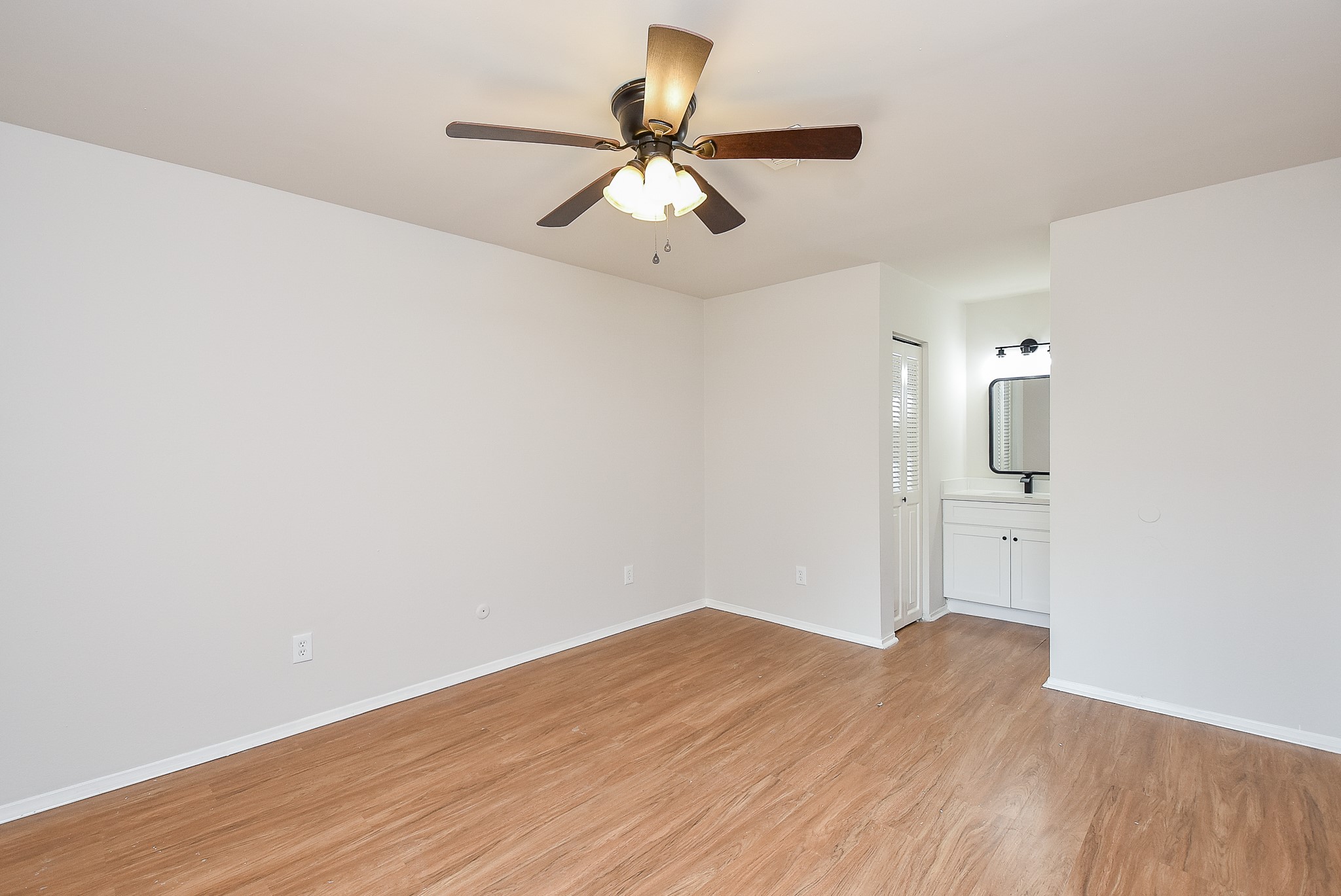 3644 Ocee Street Houston, TX 77063 - Photo 27 of 32 a view of empty room with wooden floor