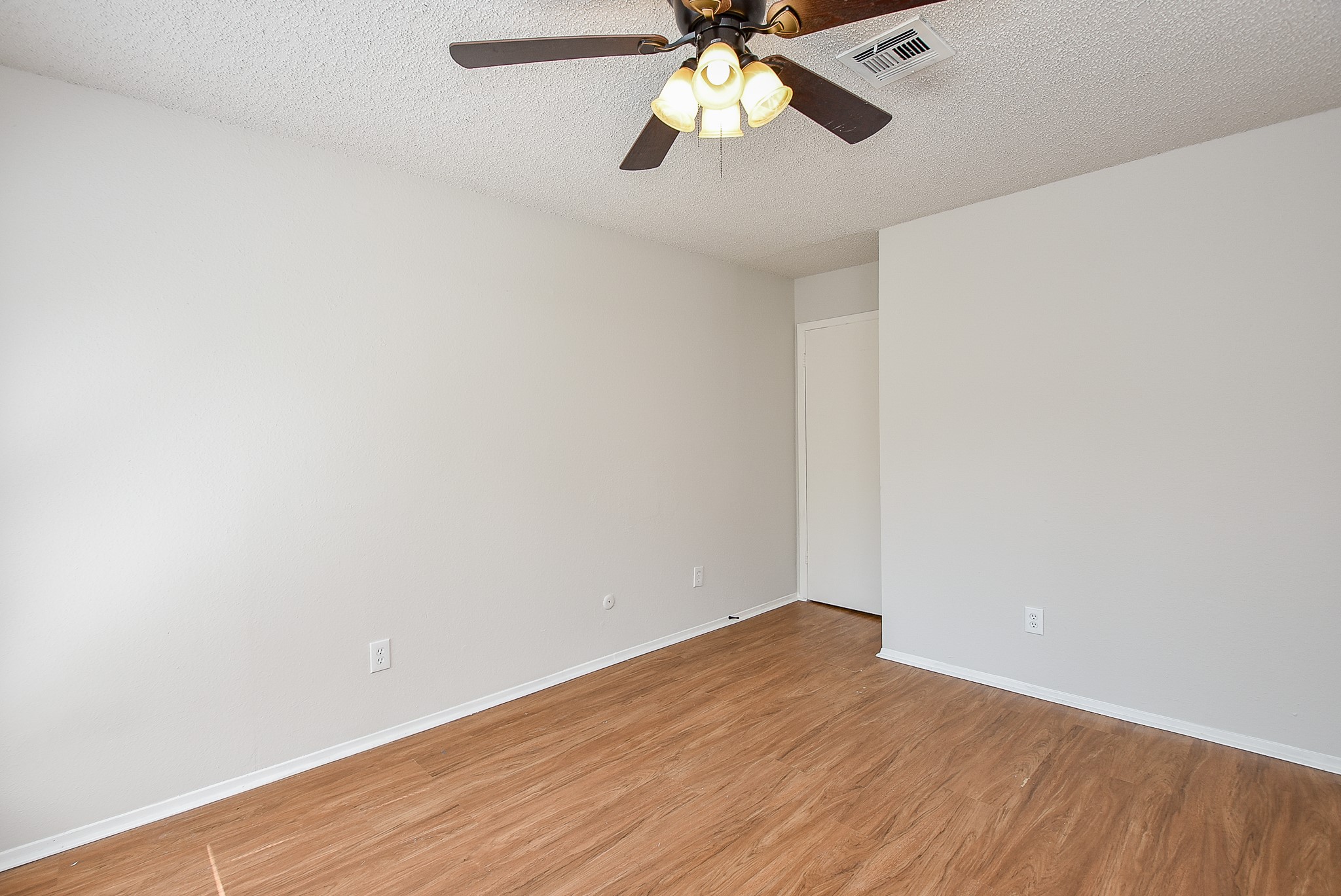 3644 Ocee Street Houston, TX 77063 - Photo 32 of 32 a view of empty room with wooden floor