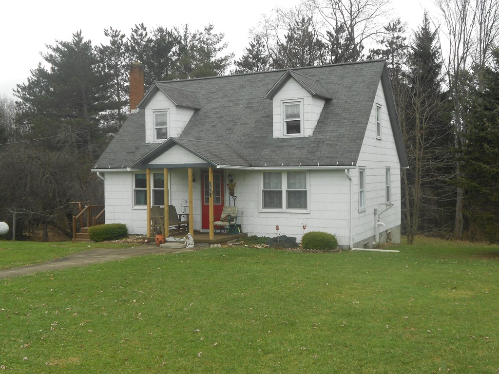 2863 Kinbahe Road Clarion, PA 16214 - Photo 3 of 11 a front view of a house with a yard and trees