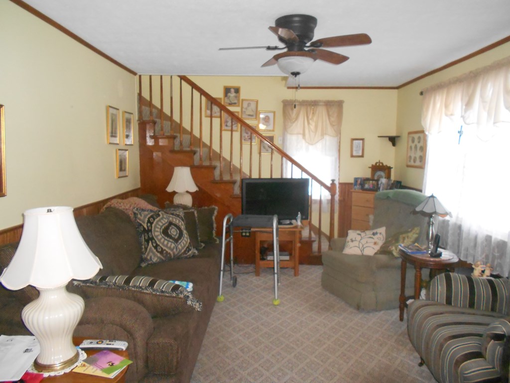 2863 Kinbahe Road Clarion, PA 16214 - Photo 7 of 11 a living room with furniture and a chandelier